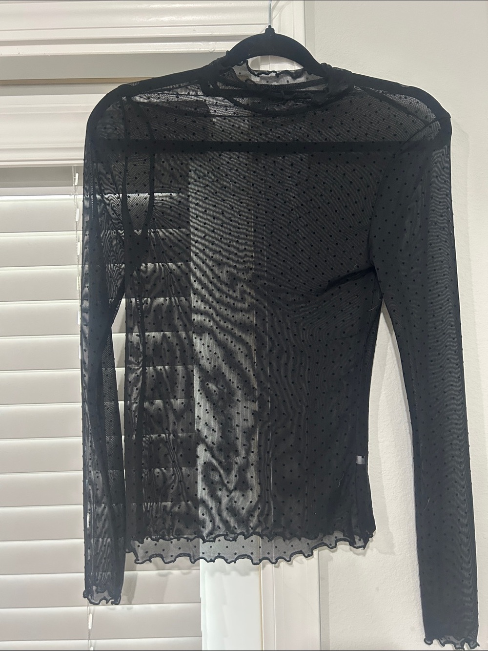 Two sheer shirts. Black with polka dots, white lace. S/M fit no size listed